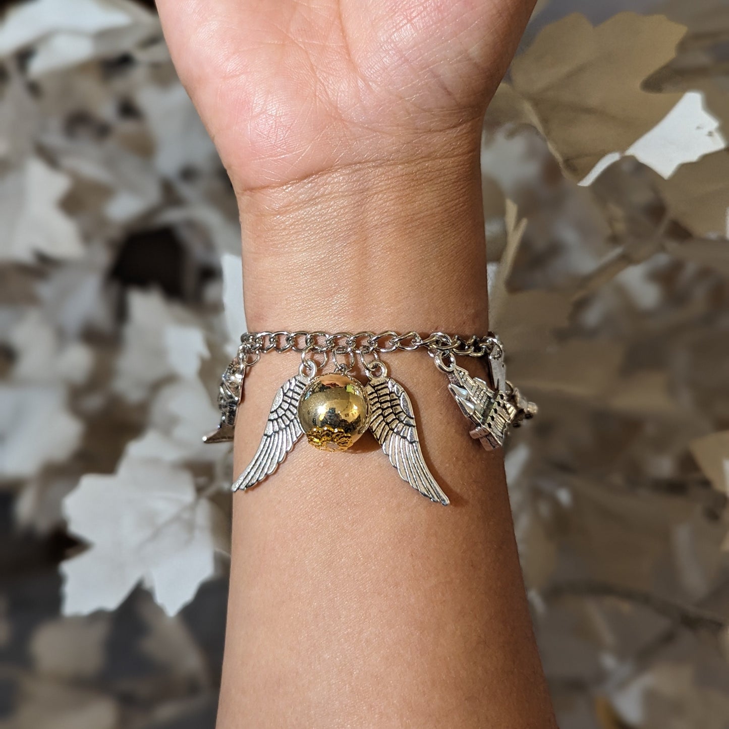 Brazalete Snitch y Tren